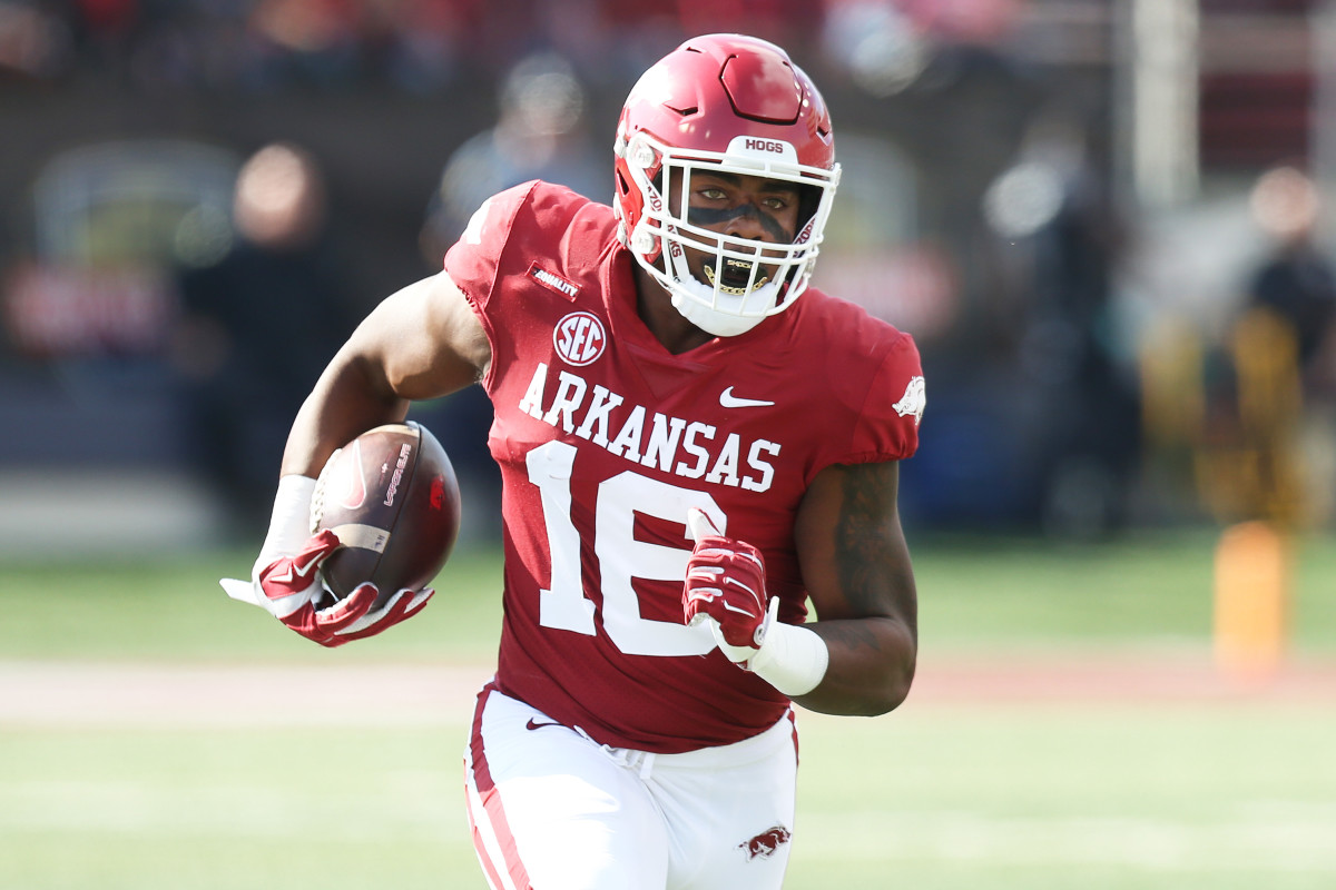 Oct 23, 2021; Little Rock, Arkansas, USA; Arkansas Razorbacks wide receiver Treylon Burks (16) rushes for a touchdown during the first quarter against the Arkansas Pine Bluff Golden Lions at War Memorial Stadium. Mandatory Credit: Nelson Chenault-USA TODAY Sports